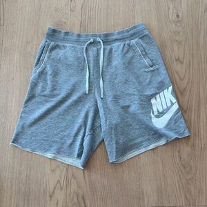 Nike Gray Athletic Shorts with White Swoosh